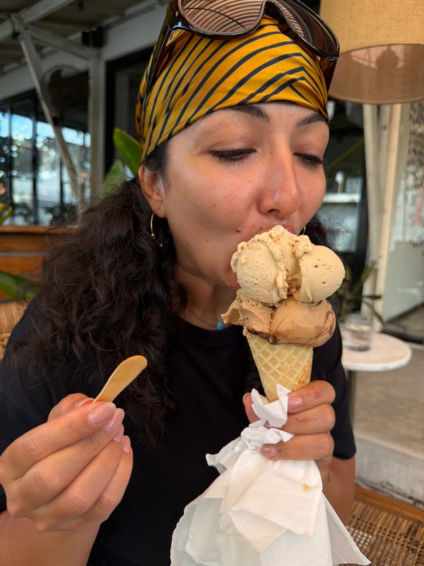 Woman enjoys early morning ice cream in North Kuta cafés