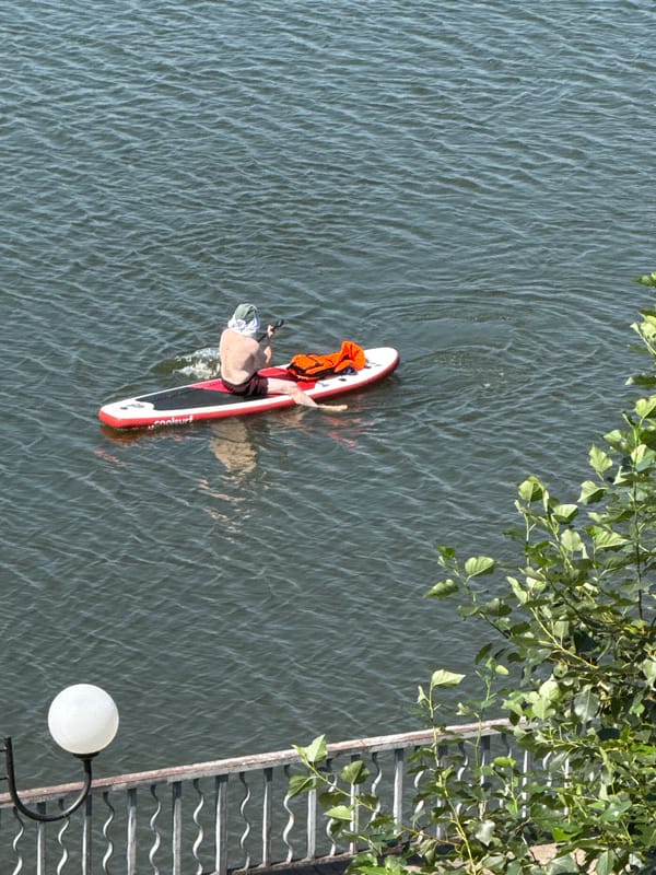 Paddleboarding and sailing on a quiet Votkinsk lake