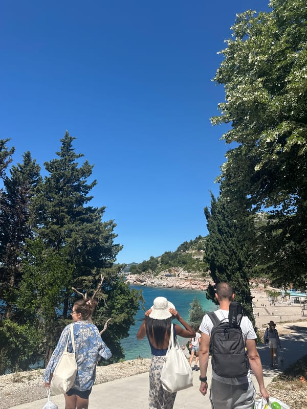 Visitors document sunny morning at Montenegro's Kamenovo beach