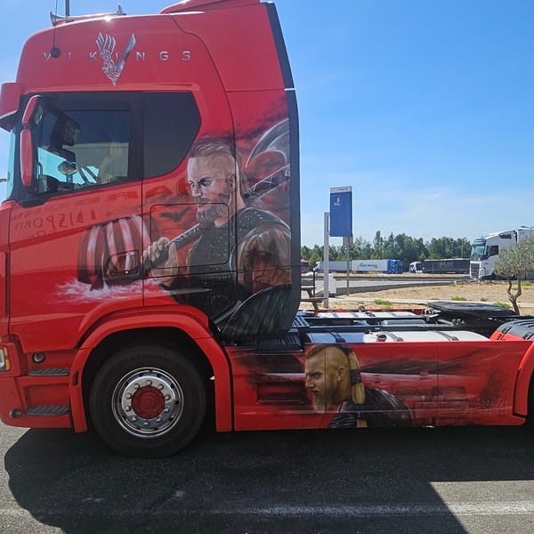 Custom Viking-airbrushed red truck parked in Vinassan, France