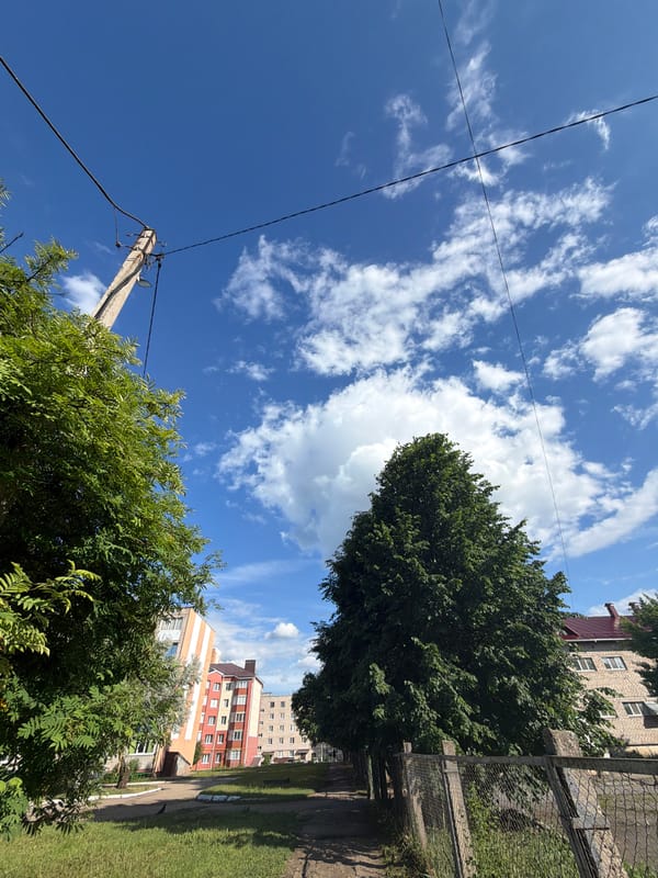 Woman documents sunny afternoon stroll through Tujmazy, Russia