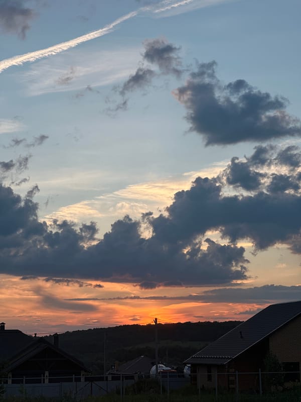 Dramatic sunset observed over rural Russian village streets