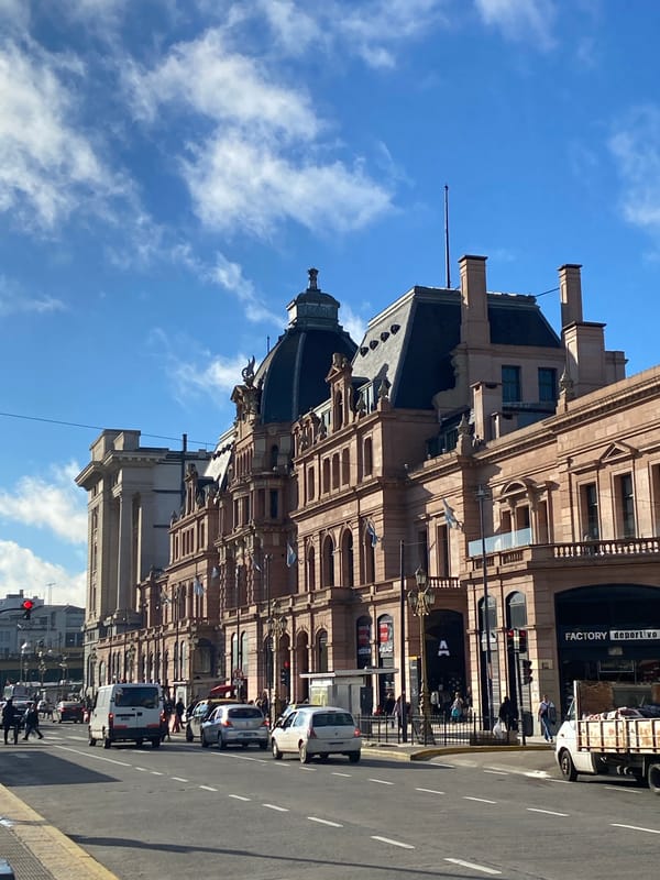 Street photography captures Buenos Aires urban scenes under clear skies