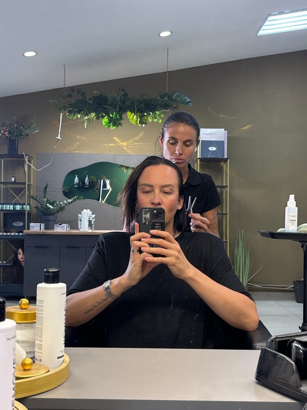 Woman documents fishing store visit and salon trip in Chaikovsky