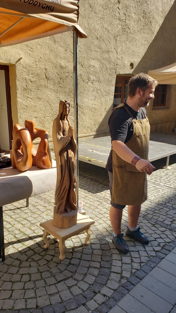 Prešov old town: craft market, street performers, and campaign vehicle
