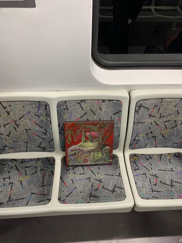 Small painting spotted on Buenos Aires transit seat