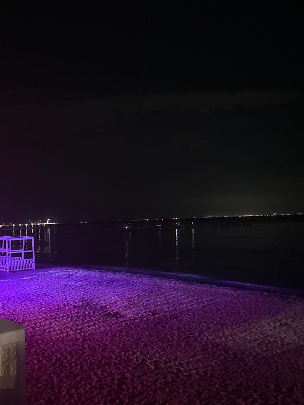 Nighttime coastal scenes documented in Yevpatoriya, Ukraine with neon lighting