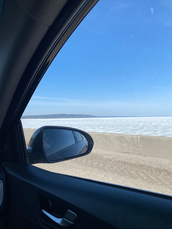 Morning highway drive in Chaikovsky captures road maintenance scene