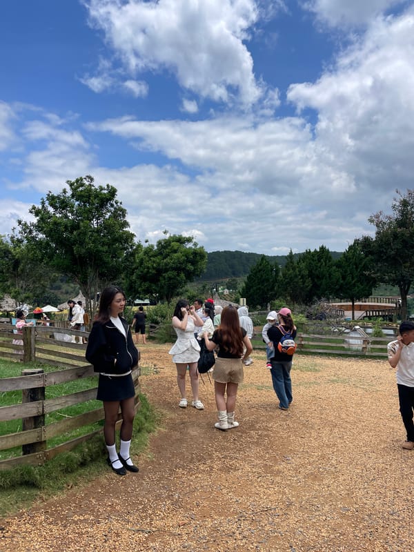 Visitors document recreational park experience in rural Vietnam