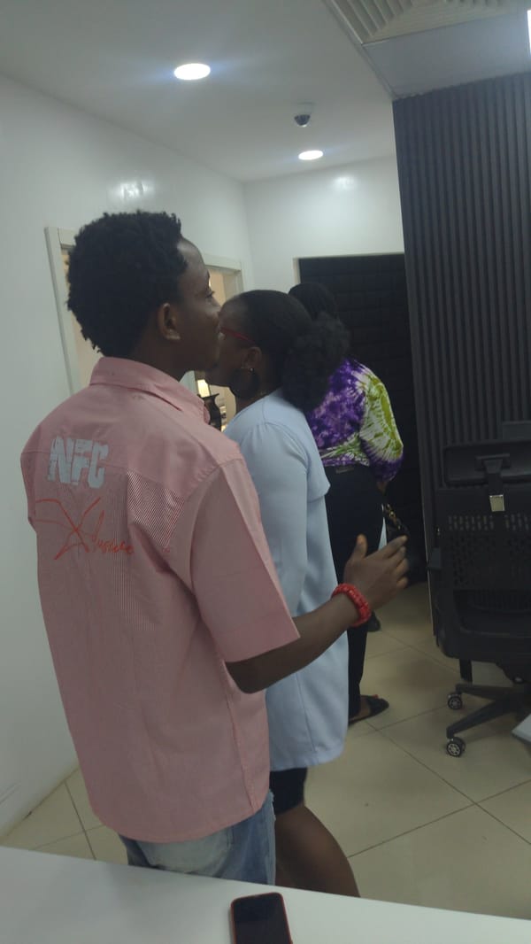 Office gathering documented in Abuja workspace