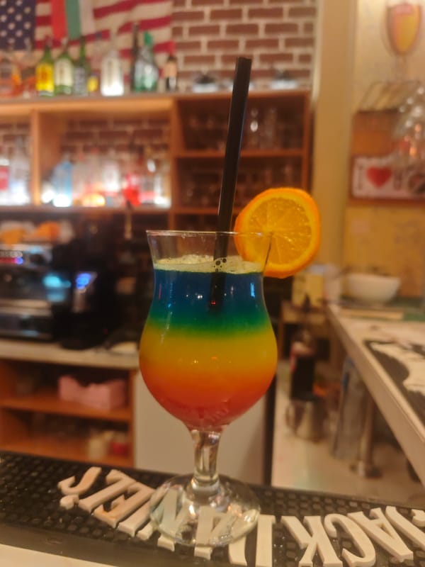 Colorful layered cocktail served at a Plovdiv bar