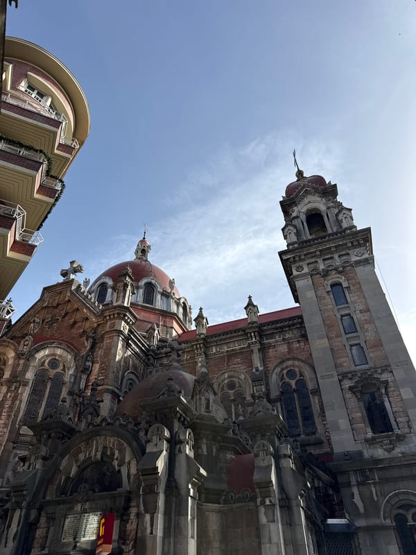 Woman takes selfies in downtown Oviedo pedestrian area