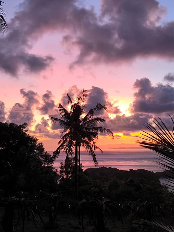 Sunset viewed from coastal cliffs in Nusa Penida, Indonesia