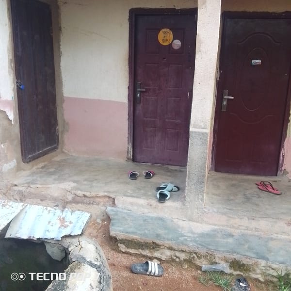 Afternoon studying in Jalingo, Nigeria, with textbooks and everyday surroundings
