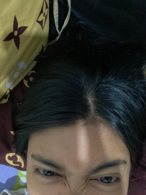Woman captures personal moments in Madiun bedroom