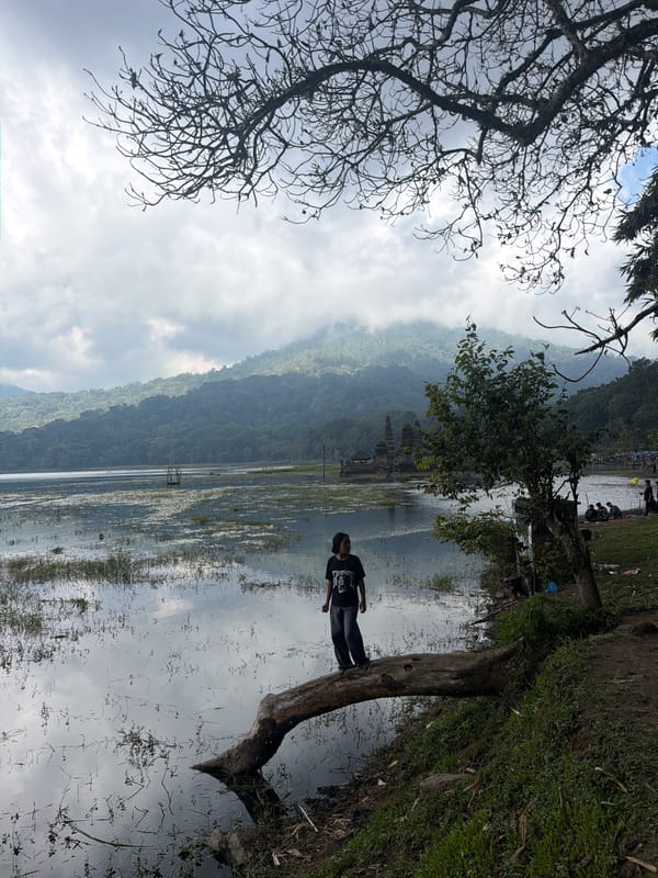 Pura Ulun Danu Bratan temple and Lake Beratan on a cloudy morning
