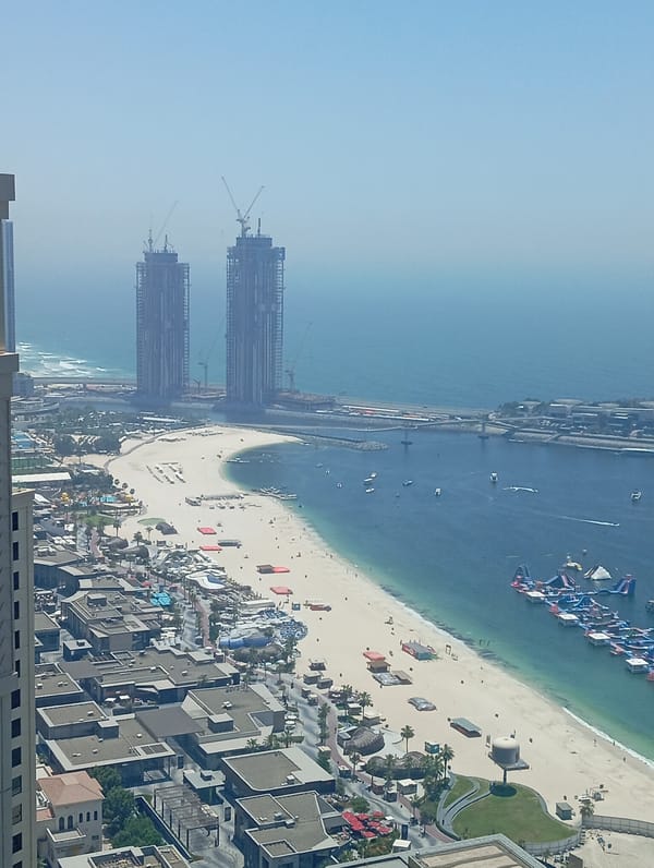 Aerial views capture Dubai's coastal skyline and bustling beaches