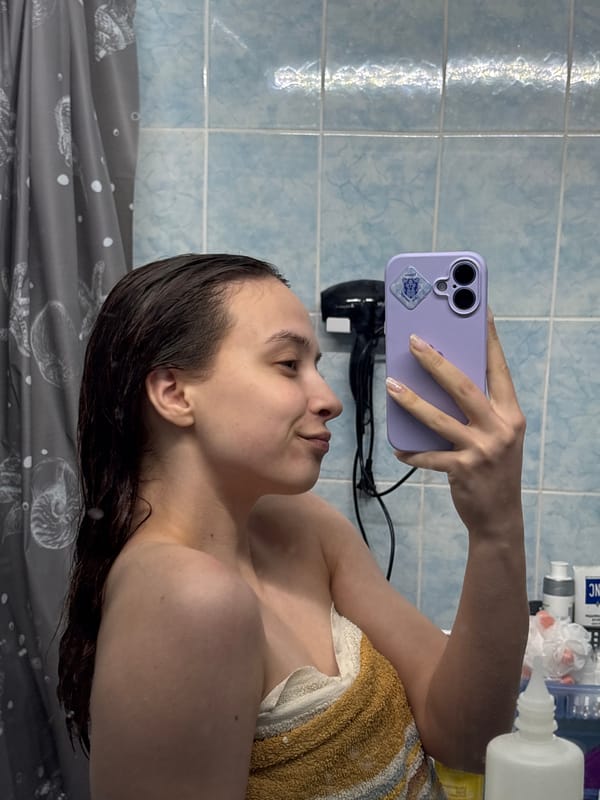 Woman takes bathroom selfies in Prикамский, Russia