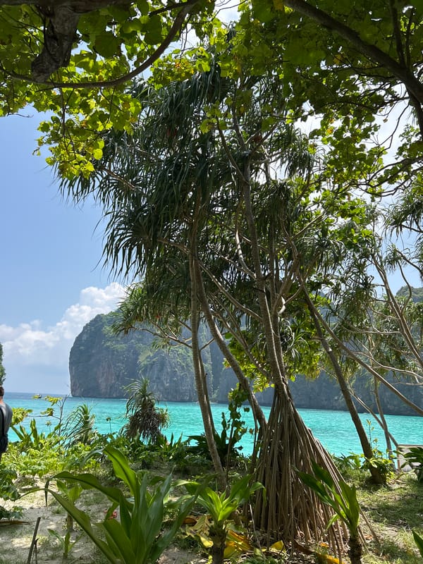 Exploring Ao Nang's beach boardwalk and limestone bay views