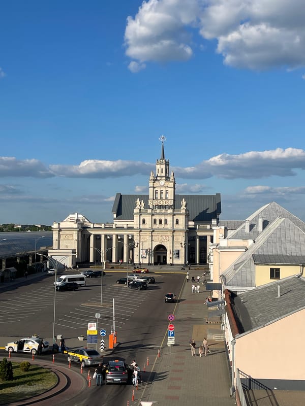 Tourist documents architectural sites and fountain in Brest, Belarus