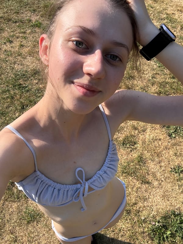 Summer day at Freibad Bürgstadt — slides, sunbathing, and town details