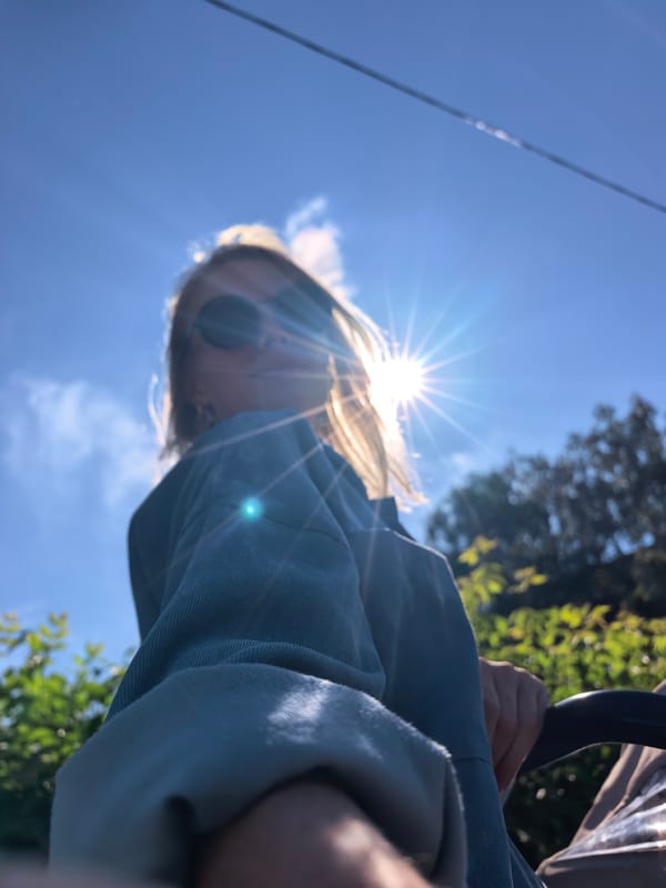 Woman takes sunny selfies in Sterlitamak, Russia