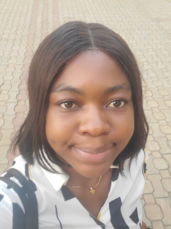 Woman documented in casual moments throughout evening in Nigeria