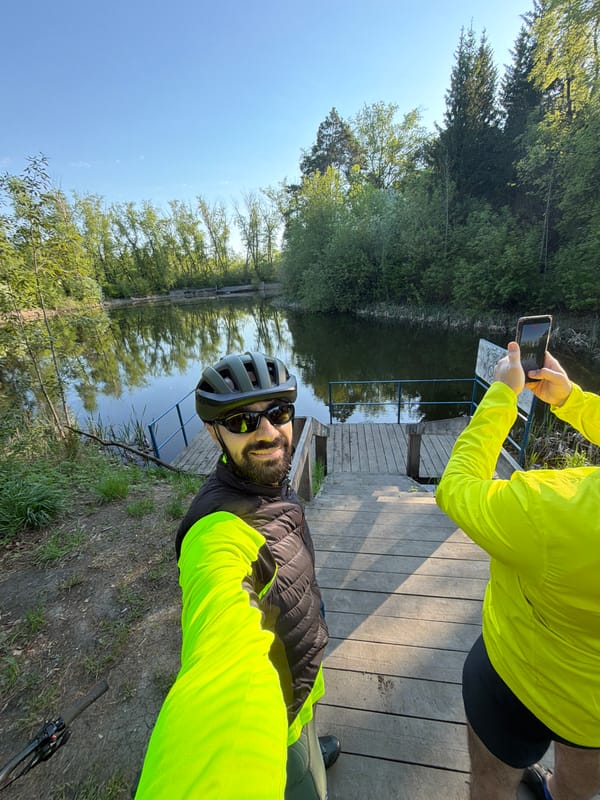 Cyclist in safety gear photographed on Tyumen waterfront dock
