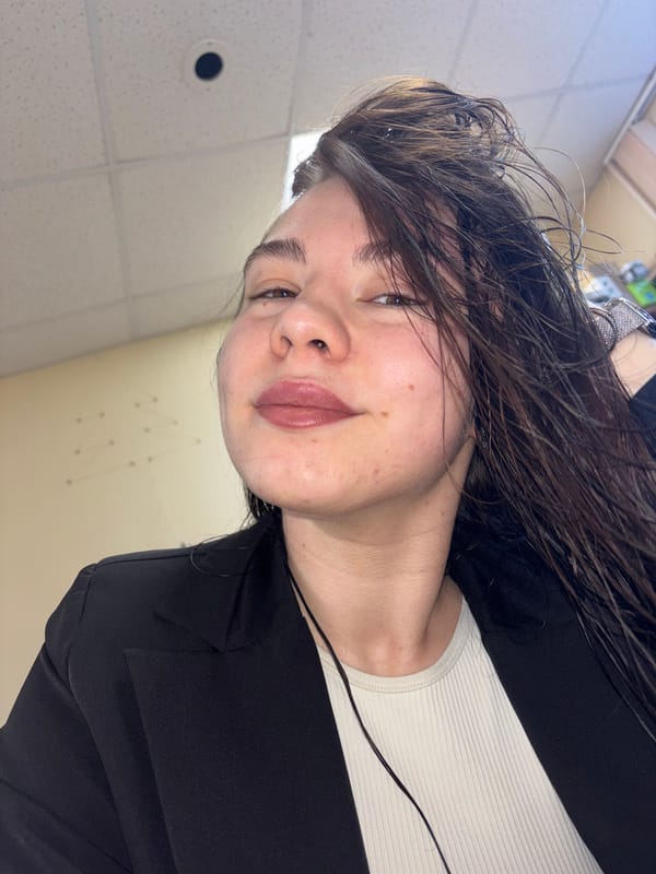 Woman takes selfie indoors in Perm, Russia