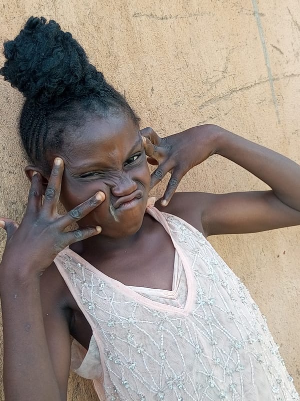 Outdoor afternoon with kids and adults in Tempure, Nigeria