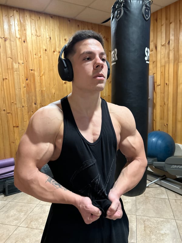 Man exercises and poses at gym in Troyan, Bulgaria