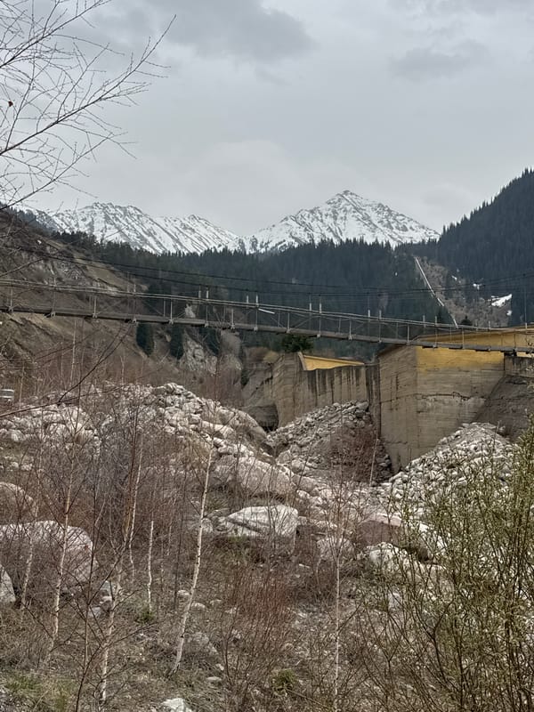 Mountain landscape with pedestrians documented near Almaty, Kazakhstan