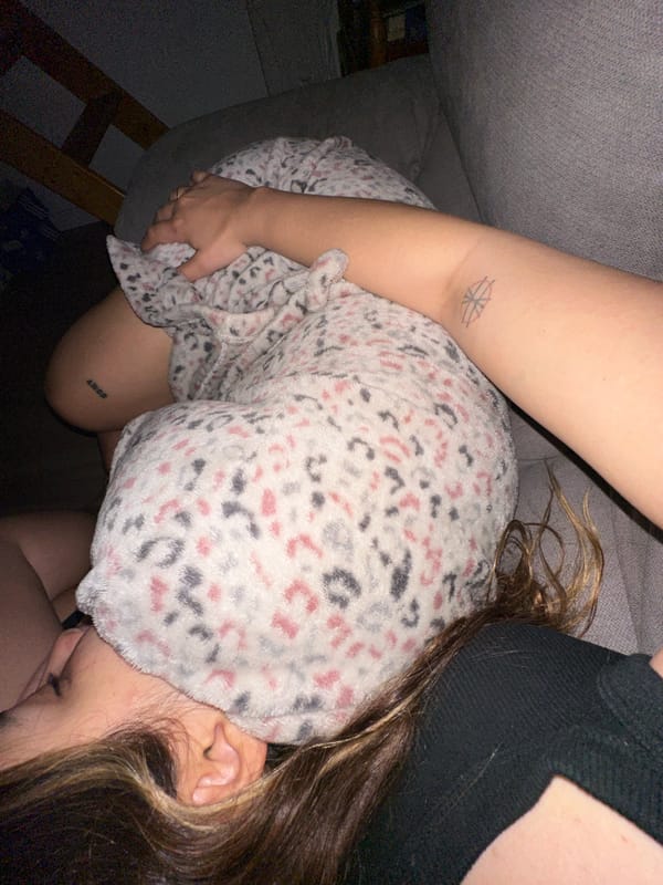 Two people captured in quiet indoor moment in Madrid