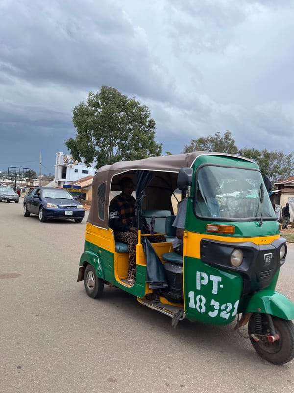 Everyday street life and market activity in Jos, Nigeria.