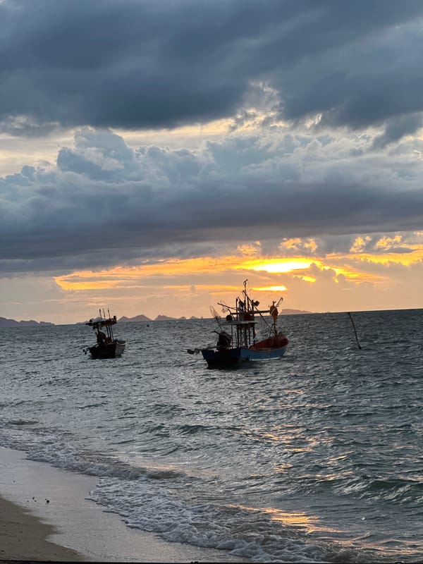 Sunset at a laid-back beach bar in Baan Thong Po