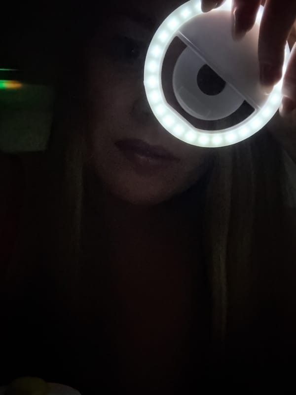 Person uses LED ring light in Chaikovsky, Russia