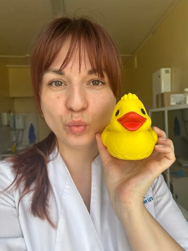 Healthcare worker takes playful selfies during early morning shift