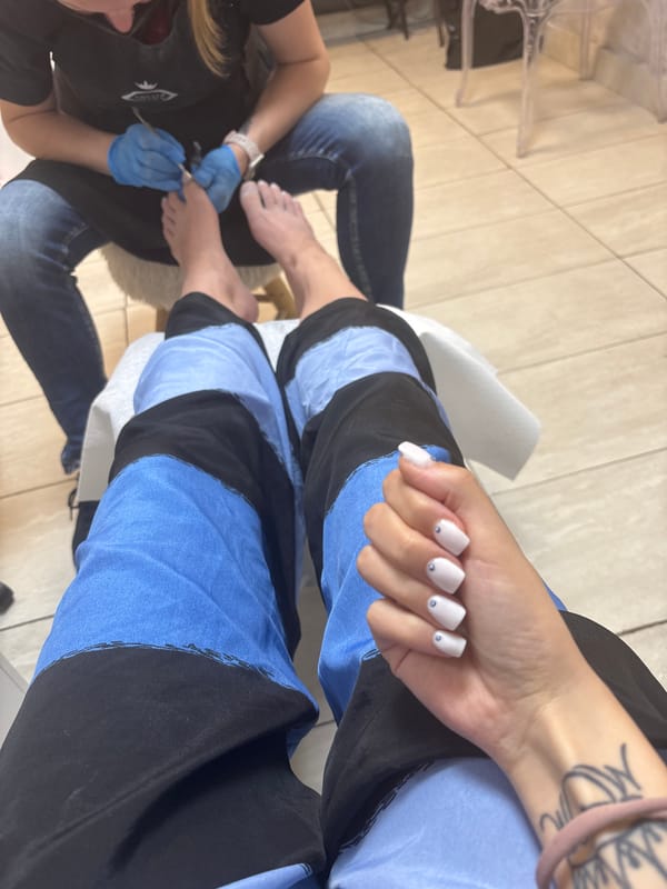 Person gets decorated manicure and pedicure at Sofia nail salon