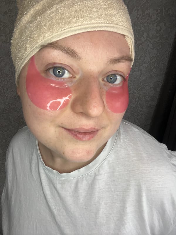 Woman receives beauty treatment with eye patches in Russia