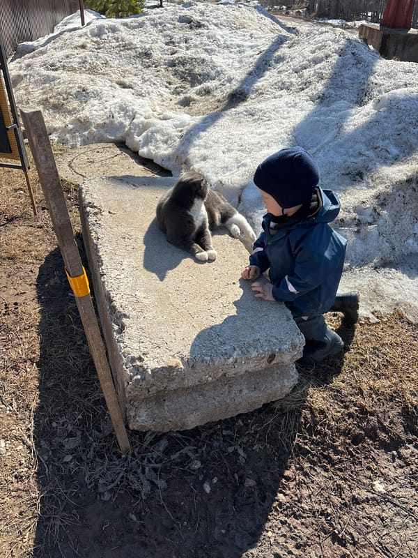 Mother and child's morning activities in rural Russia