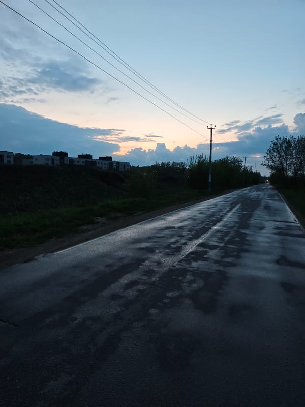 Wet road observed in Yakhroma amid cloudy evening conditions