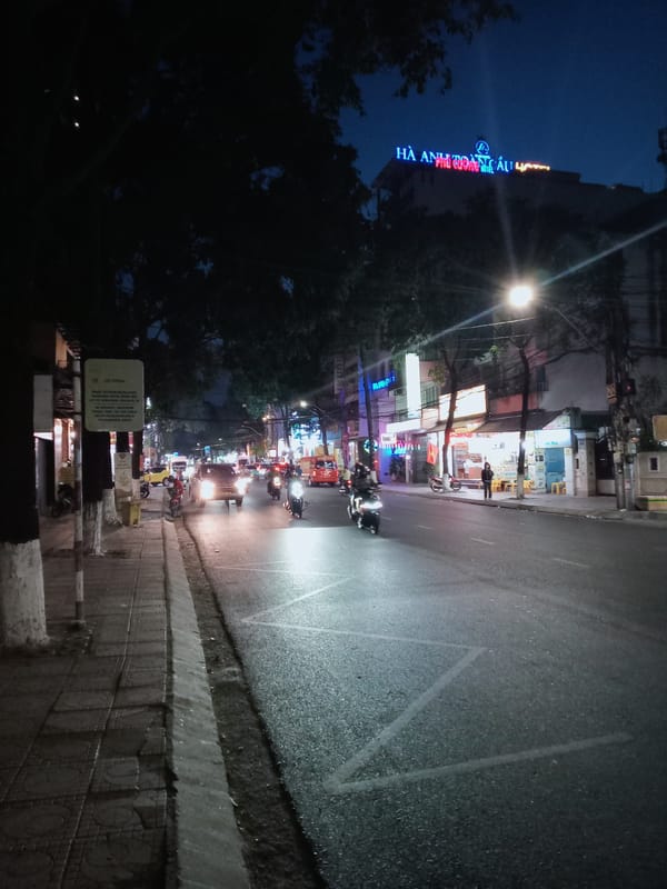 Evening street activity documented in Nha Trang, Vietnam
