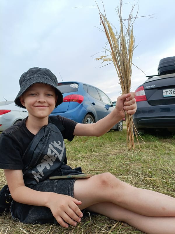 Relaxing in a grassy field in Lagunovo on a cloudy day