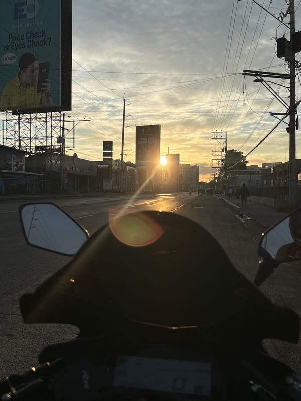 Early morning motorcycle ride through central Davao City streets