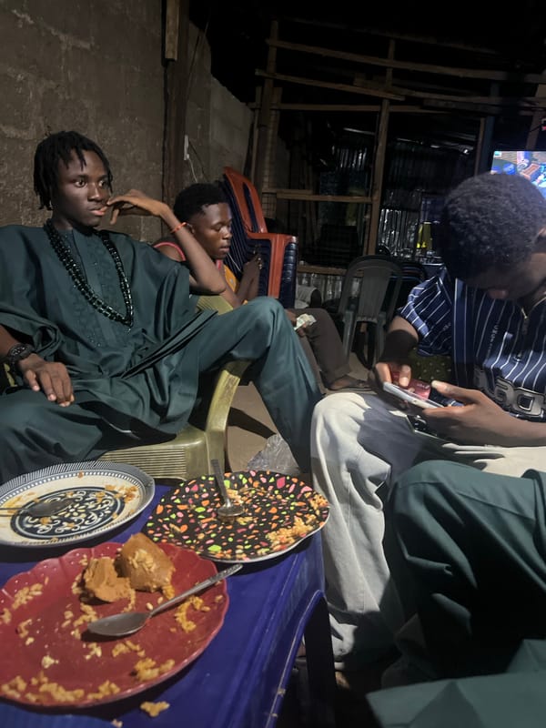 Social gathering documented in Howayi, Nigeria evening scenes