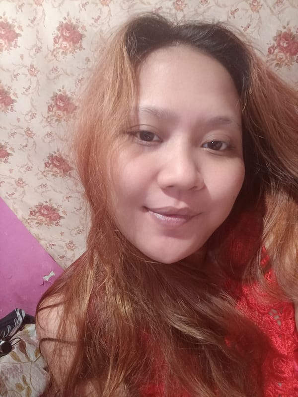 Bedroom selfie series in Depok with a celebratory note