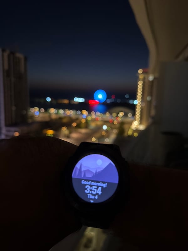 Night observer documents Lusail's illuminated waterfront and Ferris wheel