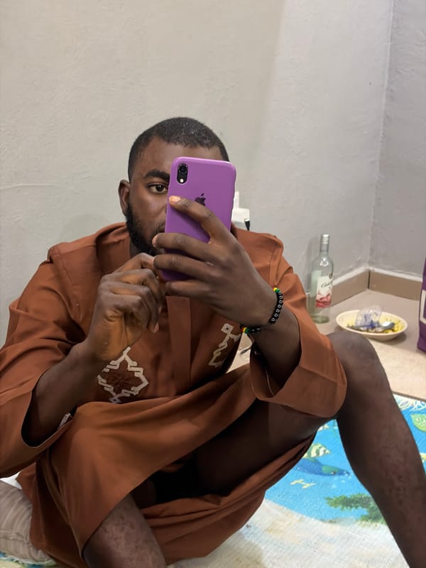 Young men gather for casual indoor meeting in Nigeria
