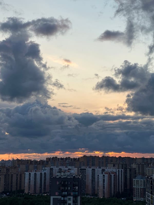 City skyline meets dramatic dusk cloud cover