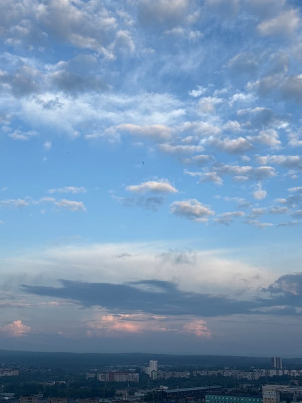 City skyline and cloud-watching from a high vantage point